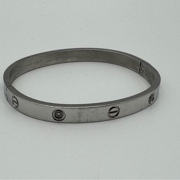 Silver Tone Screw Motif Bangle Bracelet Faux Diamond Accents - Picture 1 of 5